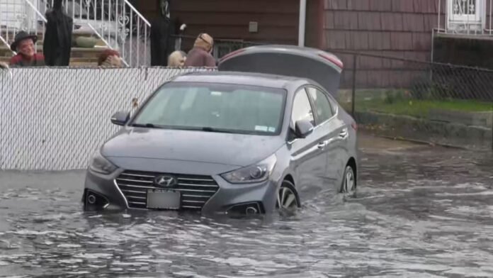 blur_QNS_Howard_Beach_Street_Cars_Flooding_Man_in_Trunk_VO_103025.jpeg